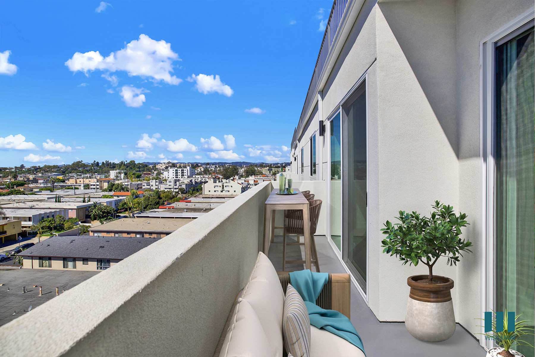 A furnished balcony at Motor Tides overlooking the neighborhood